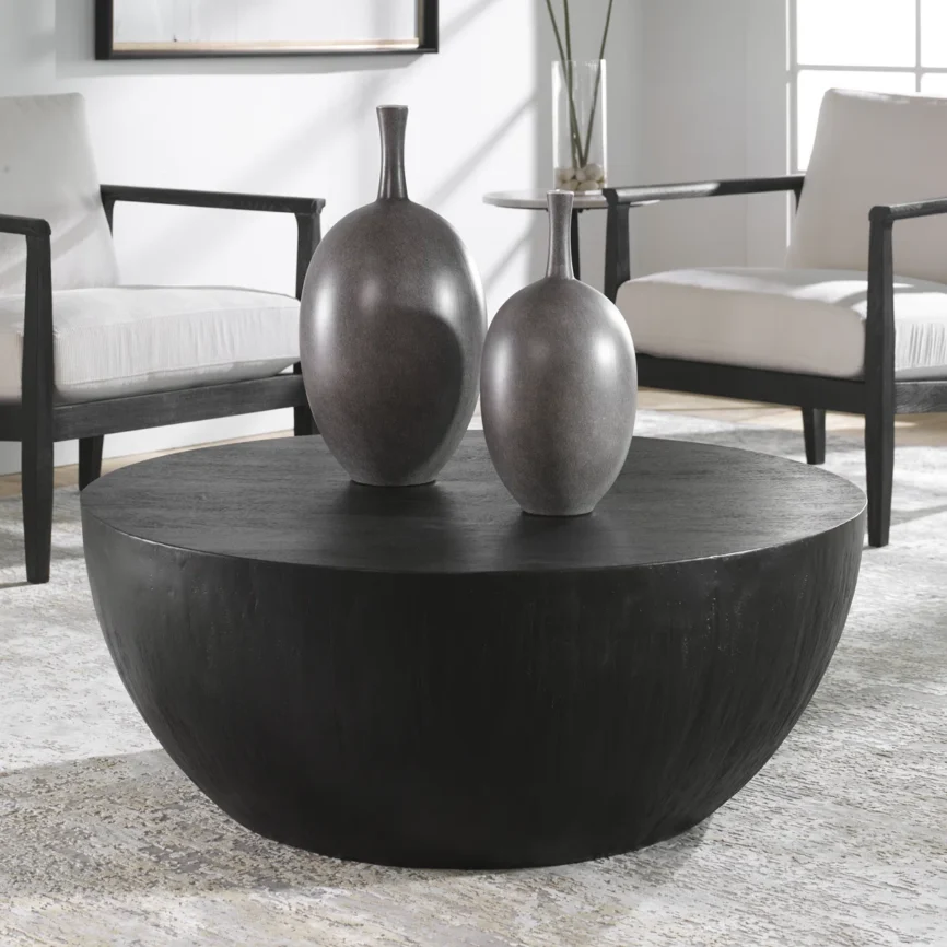 Black round coffee table with glossy finish, 106 cm diameter, crafted from mango wood and engineered wood, suitable for indoor and outdoor use