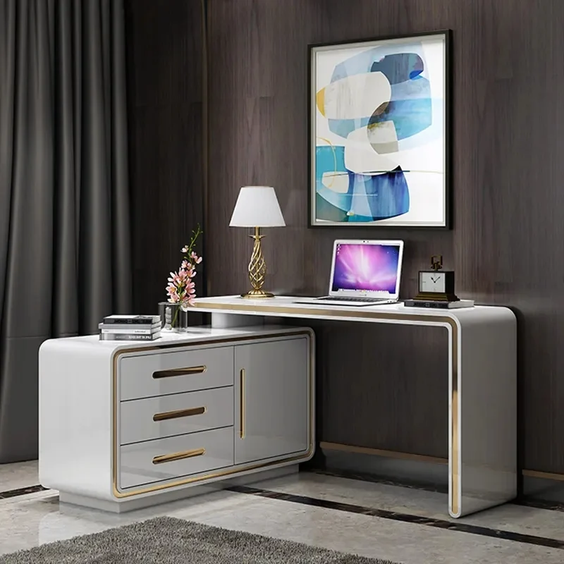Modern 120 cm L-shaped rotating executive office desk in glossy white with gold accents, featuring 360° swivel design, three drawers, and two shelves for storage