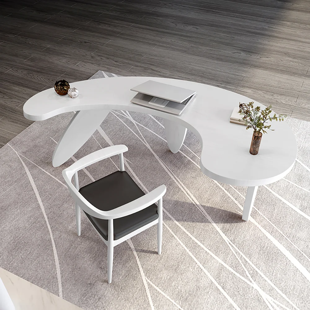 Modern curved white executive writing desk with three oval legs, engineered wood construction, and angled edges in a contemporary white finish.