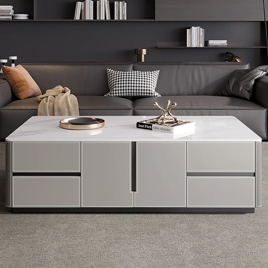 Rectangular coffee table with sintered stone top, solid wood cabinet wrapped in glossy leather, carbon steel base, rounded arc edges, and multiple storage drawers and cabinets.