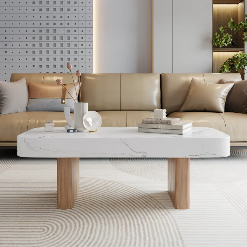 Aurora marble-wood coffee table with rectangular faux marble top, sled-style wooden base, and smooth rounded edges — modern minimalist living room furniture