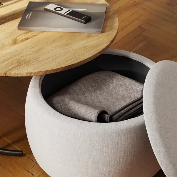 walnut‑effect coffee table with upholstered pouffe stored underneath