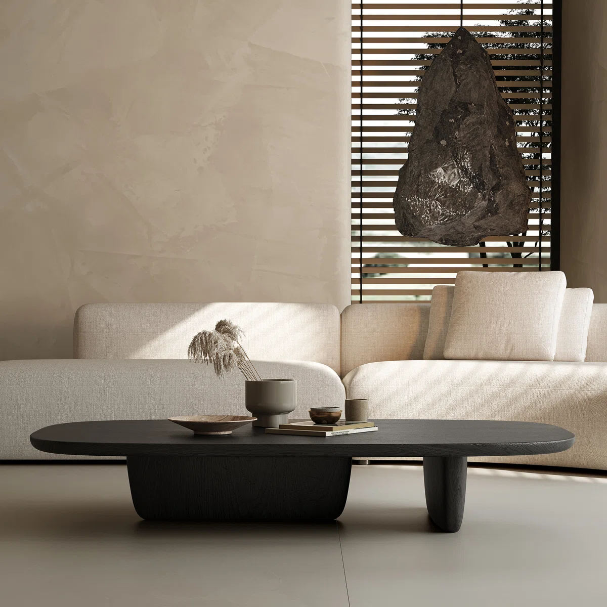 oval matte black coffee table with pedestal base