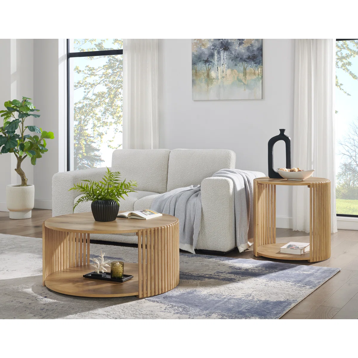 Round wood slatted coffee table with open shelf and hidden wheels, modern design in neutral finish.