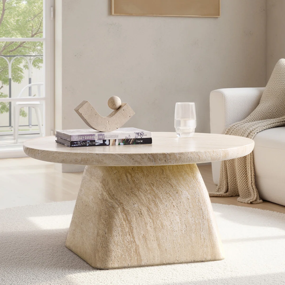 Liora Modern Coffee Table with round concrete pedestal base and marble-inspired textured top, minimalist design for contemporary living room