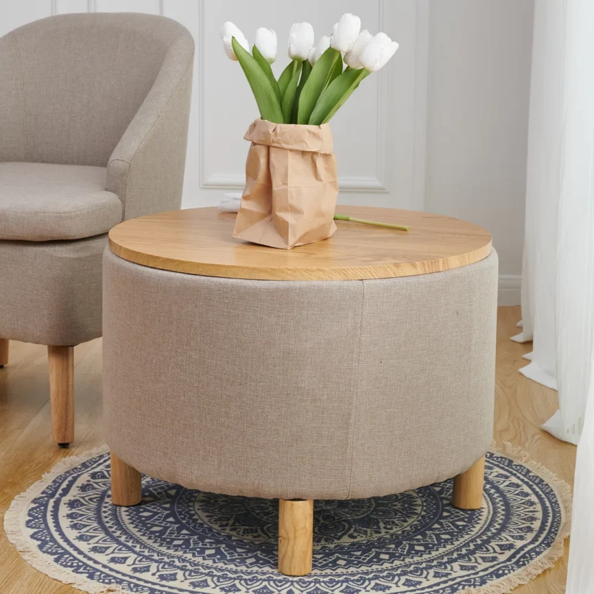 Round solid wood coffee table with three-leg base, hidden storage cabinet, and removable tray