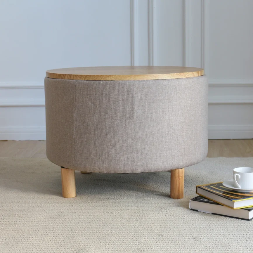 Round solid wood coffee table with three-leg base, hidden storage cabinet, and removable tray