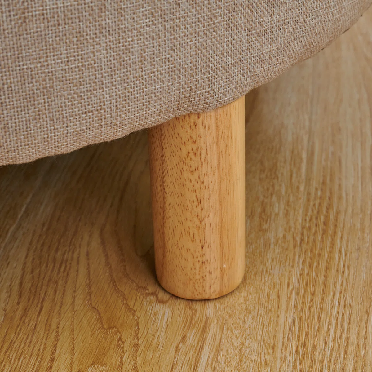 Round solid wood coffee table with three-leg base, hidden storage cabinet, and removable tray