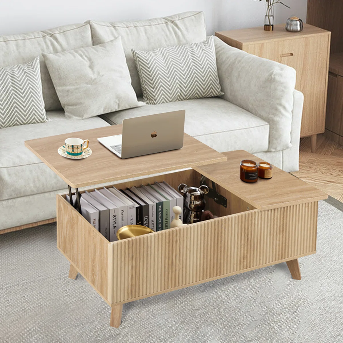 Transform your living room with the Maris Wave Lift-Top Coffee Table. Featuring a fluid wave-patterned surface, hidden storage, and a smooth lift-top design, this mid-century modern piece blends elegance with everyday functionality—perfect for dining, working, or keeping essentials neatly tucked away.