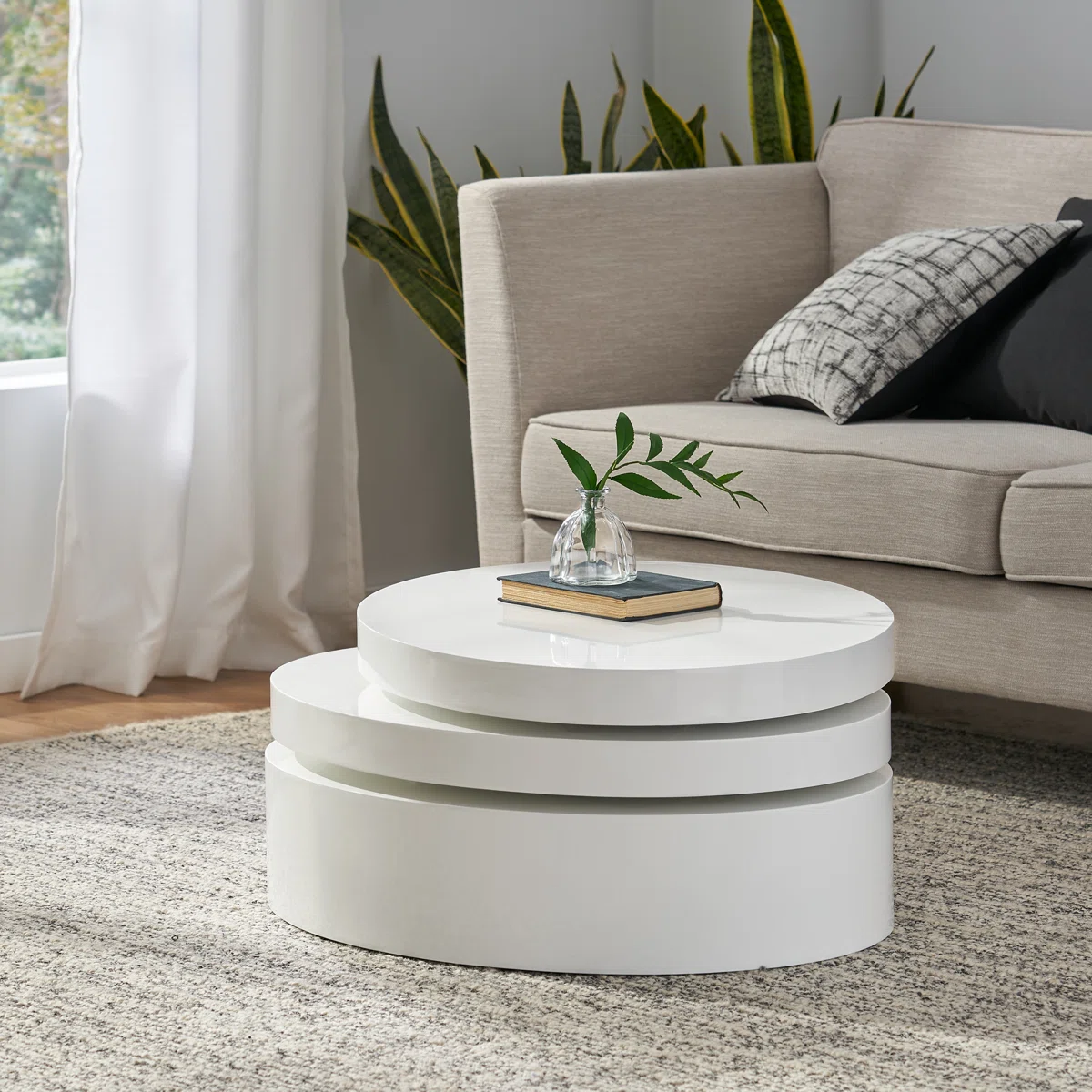 Orbit Rotating Coffee Table in white high-gloss finish, 80 cm round top with pivoting tiers and hidden storage
