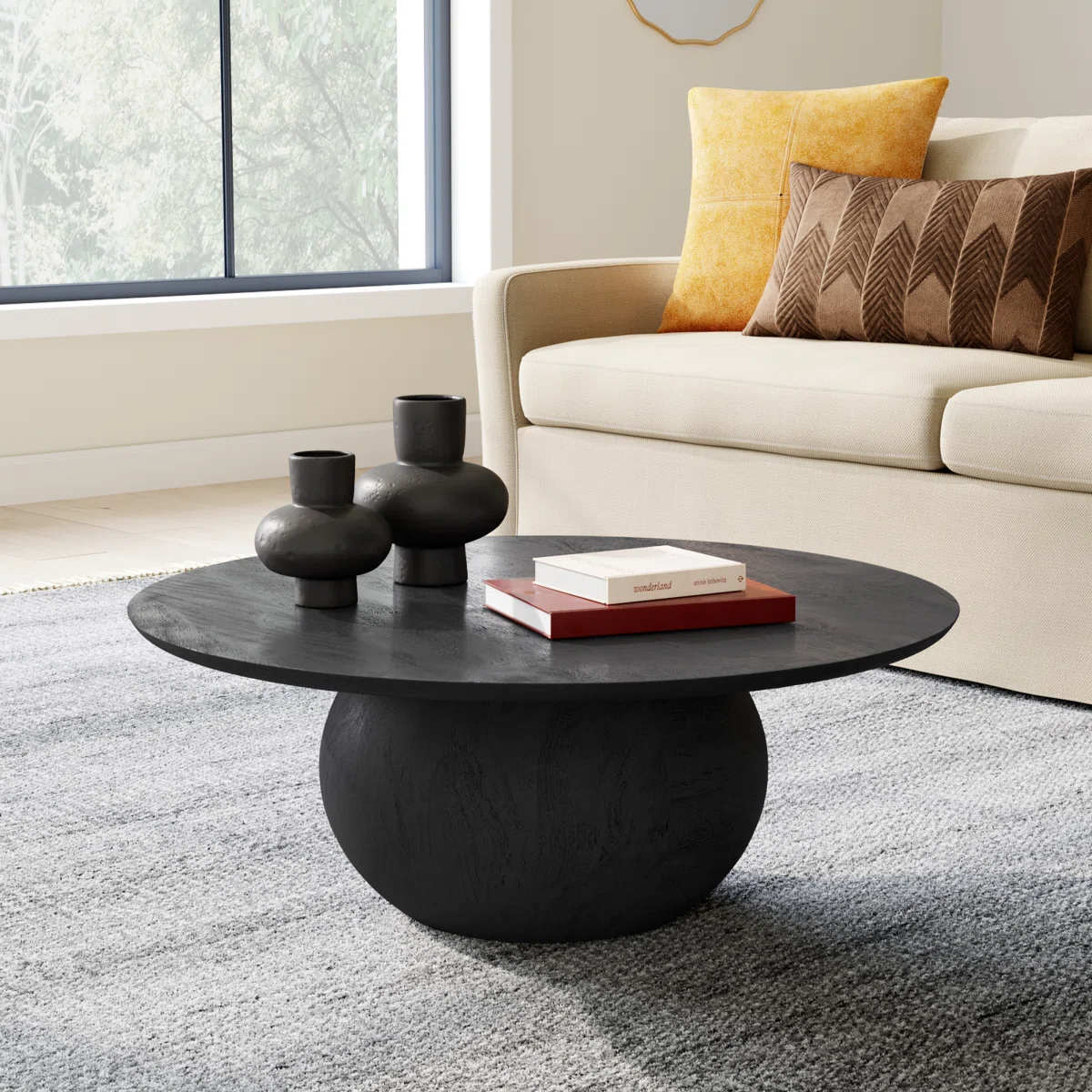 The Solara Pedestal Coffee Table is a sculptural statement piece crafted from solid wood
