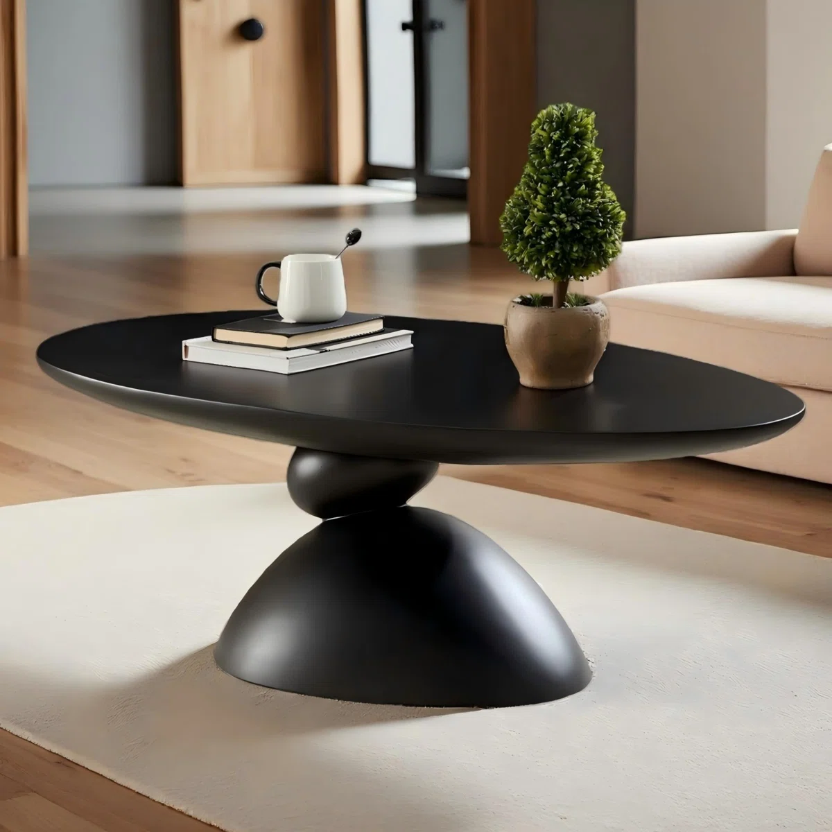 The Zenith Stone Oval Coffee Table is a sculptural centerpiece inspired by Tibetan stone-stacking rituals, symbolizing harmony and good fortune