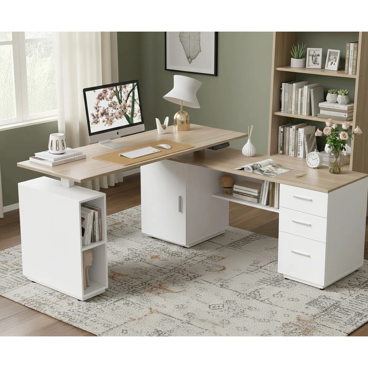 Light walnut L-shaped electric standing desk with white steel frame, file cabinet, and storage shelves