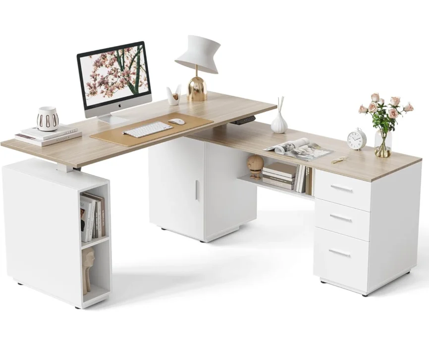 Light walnut L-shaped electric standing desk with white steel frame, file cabinet, and storage shelves