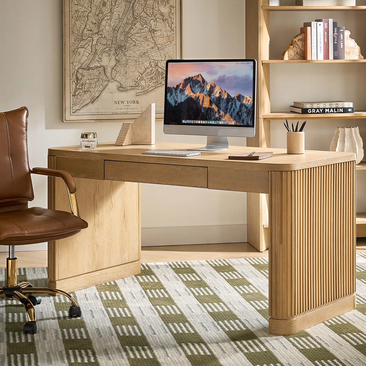 Seadrift oak desk with fluted wood legs, power outlets, USB ports, and keyboard tray
