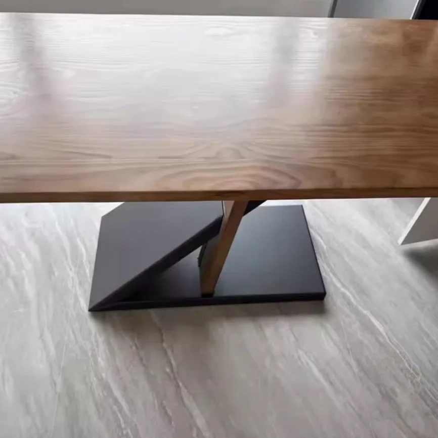 Orion executive desk with solid hemlock wood tabletop and innovative wood-metal leg design, offering spacious surface and modern stability