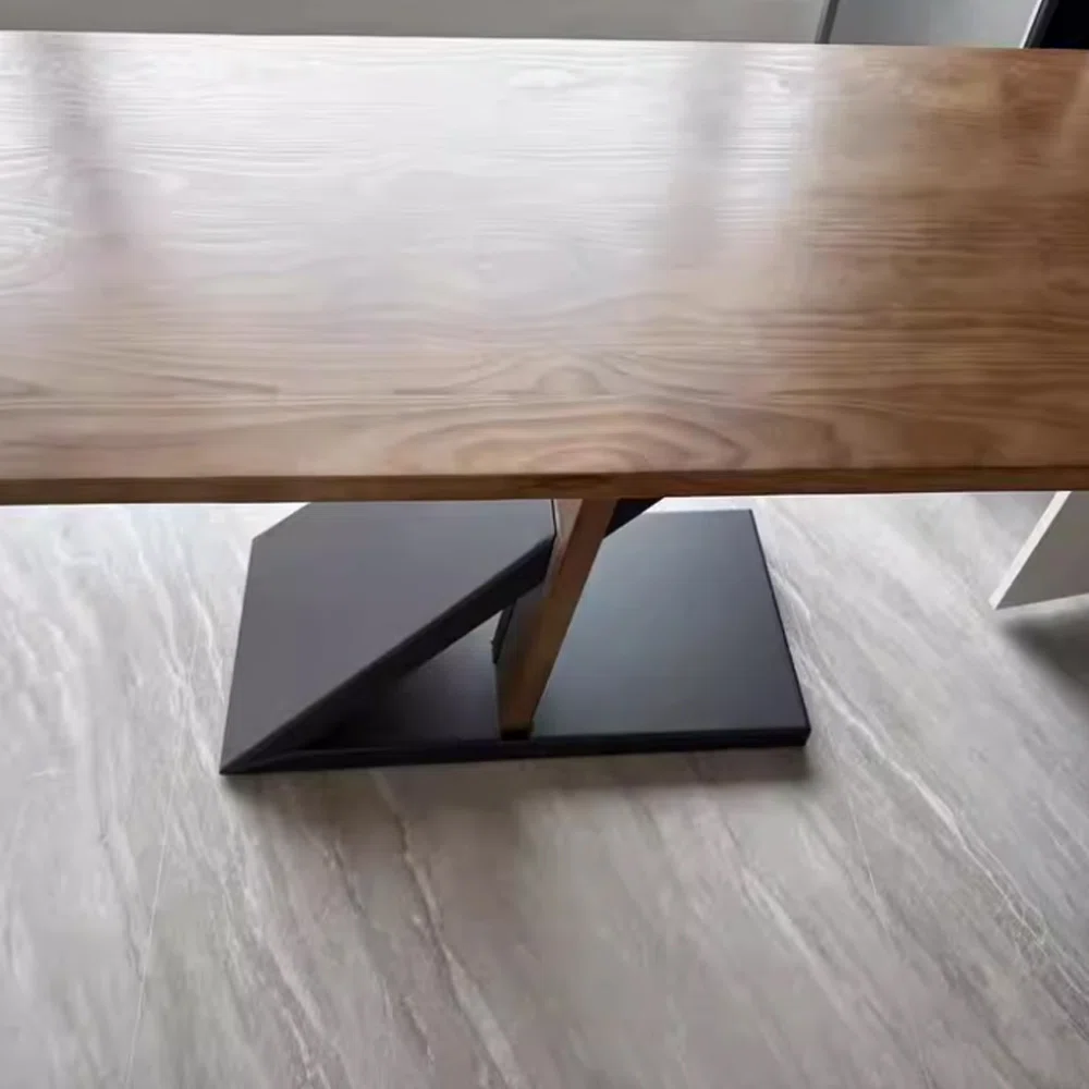 Orion executive desk with solid hemlock wood tabletop and innovative wood-metal leg design, offering spacious surface and modern stability