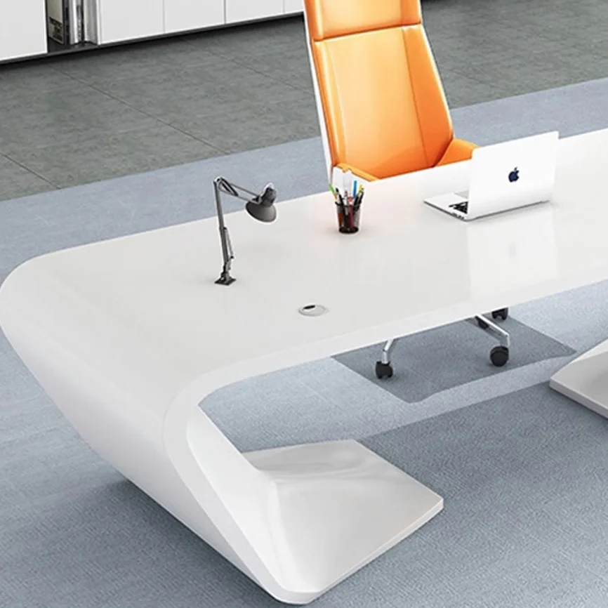 Brown solid wood modern office desk with white legs, spacious surface, and integrated storage drawers