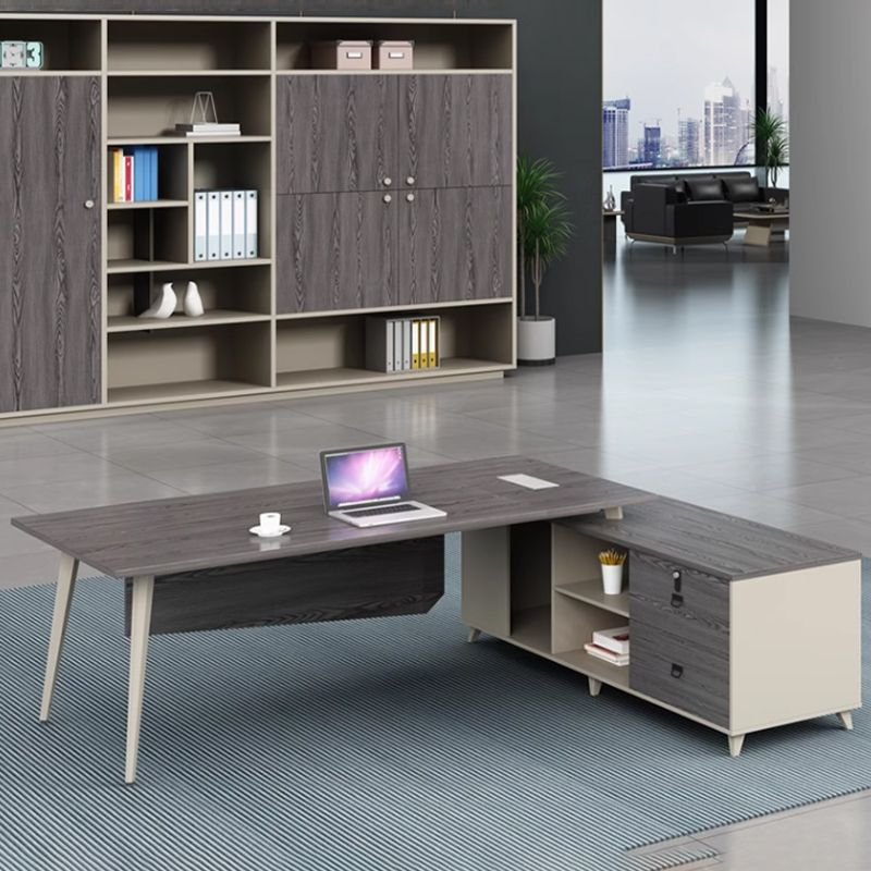 Modern L-shaped executive boardroom desk with integrated cable management, CPU storage, drawers, and desk return.
