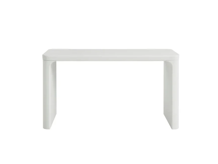 Minimalist cream-colored home office desk with sculptural lines, MDF frame, and spacious tabletop.